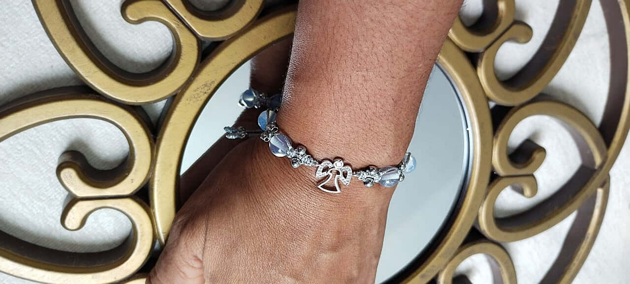 Ladies bracelet with angel and opal