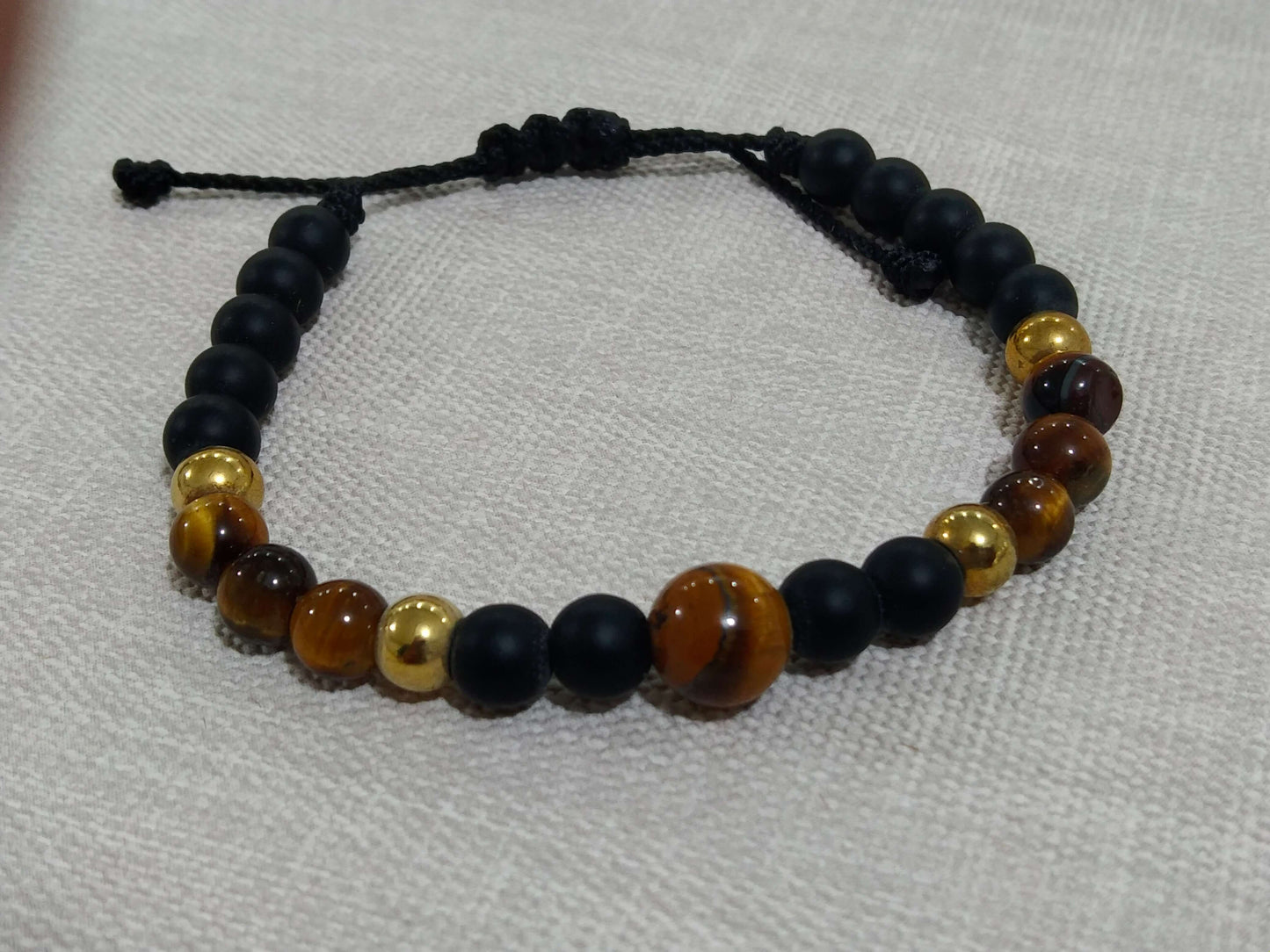 Onyx and tiger's eye bracelet for men: Strength and style in one piece