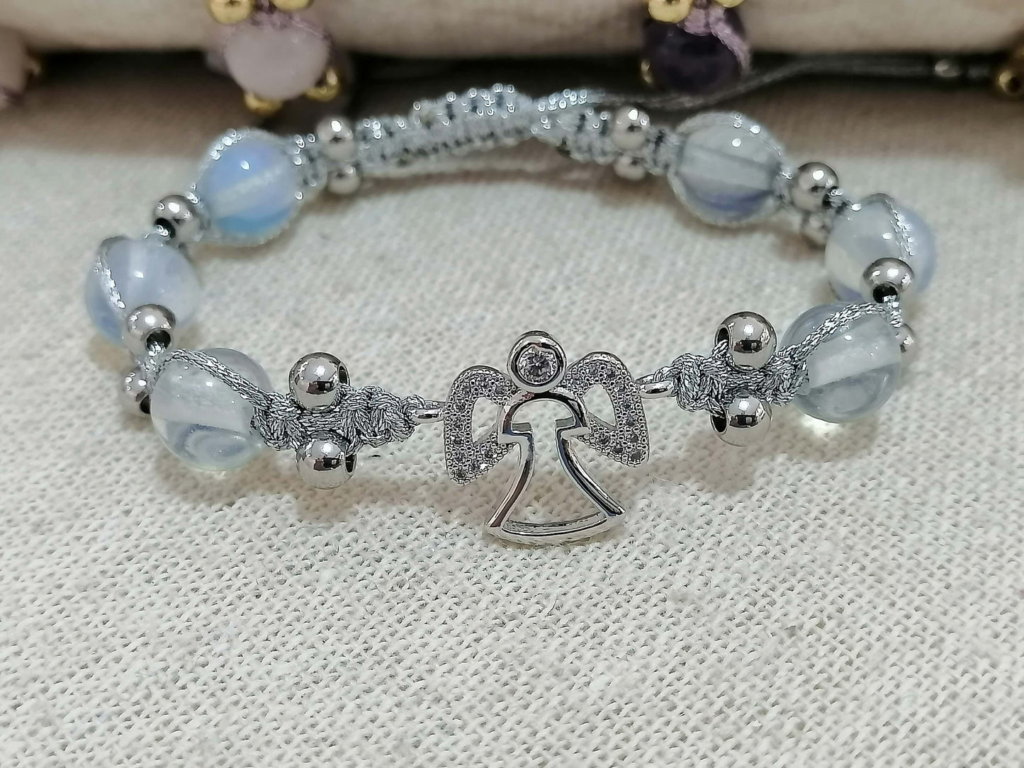 Ladies bracelet with angel and opal