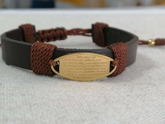 Leather bracelet with steel plate of the Our Father: an accessory of faith and style.